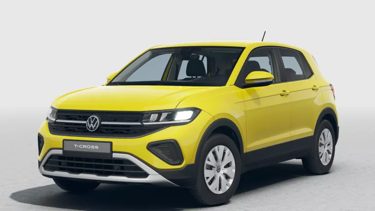 Gelber VW T-Cross von vorne rechts, mit Dachreling und weißen Radkappen.