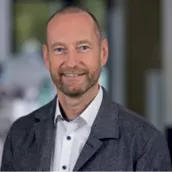 i.A. Carsten Schöler