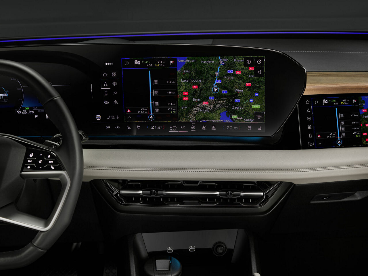 Audi Q6 e-tron dashboard with digital display showing navigation map across European cities like Luxembourg, Bern, Zurich, and Munich, with multimedia controls