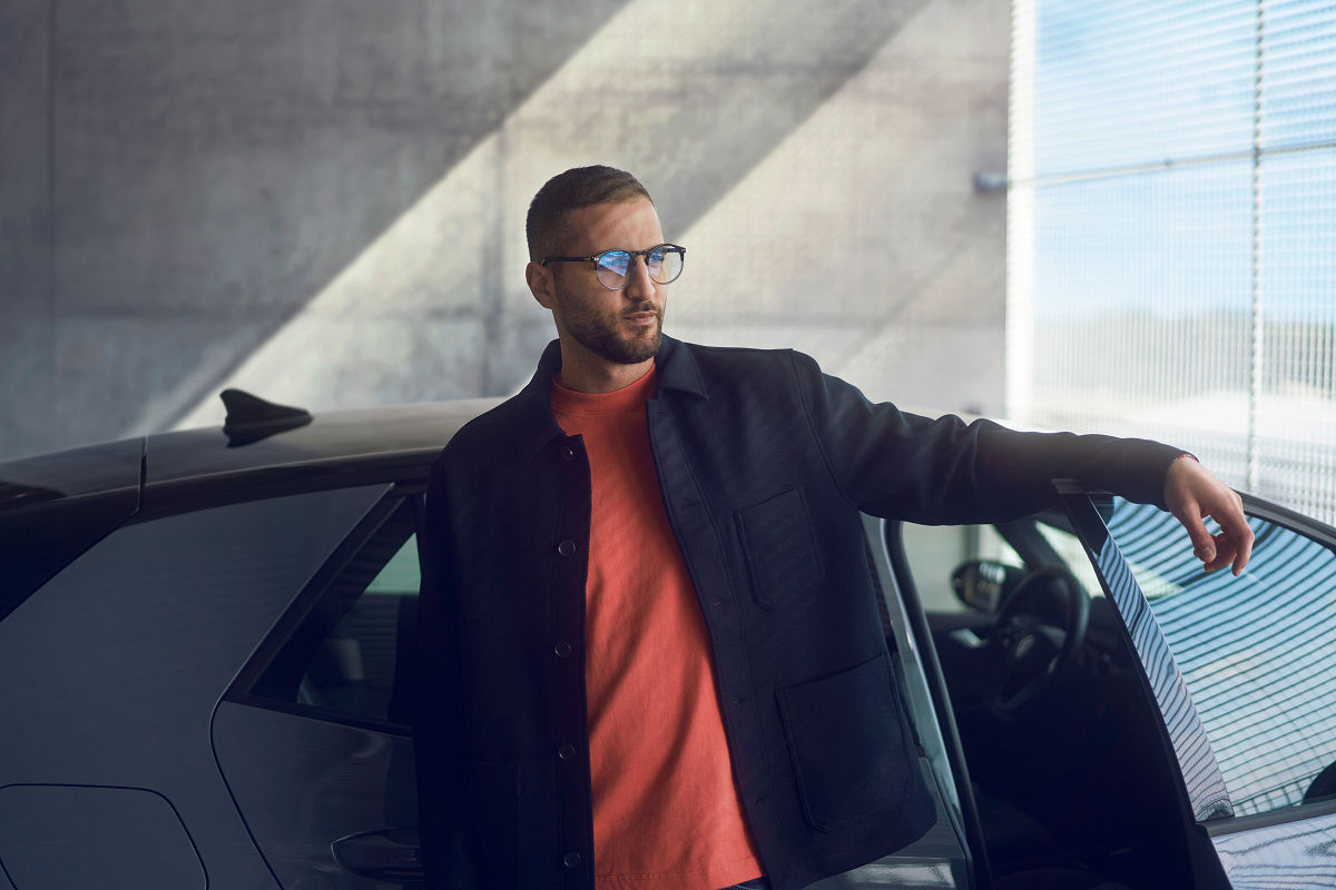 man with an electric car