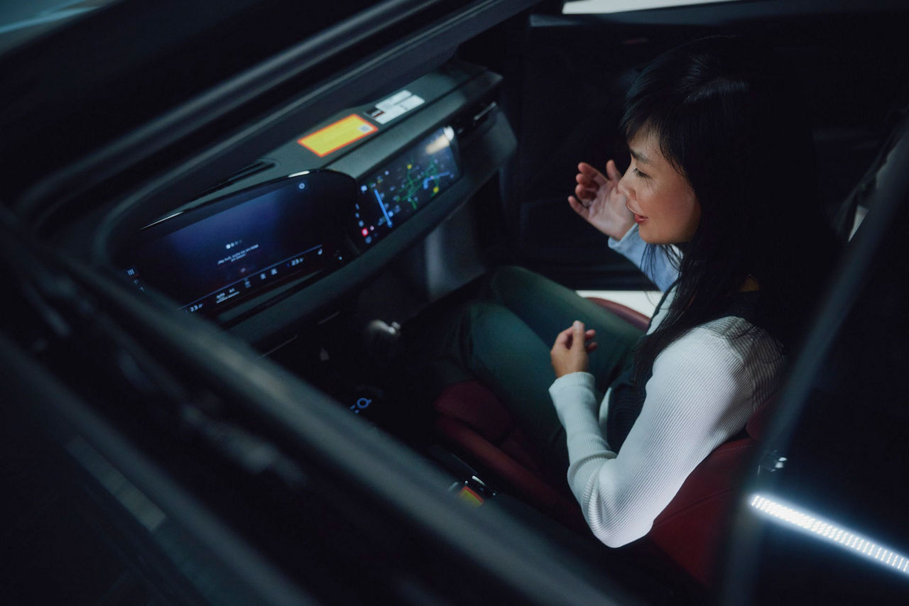 women using the digital assist in the car