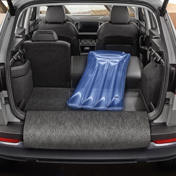 Fold-out boot mat                                                                                            with a bumper cover