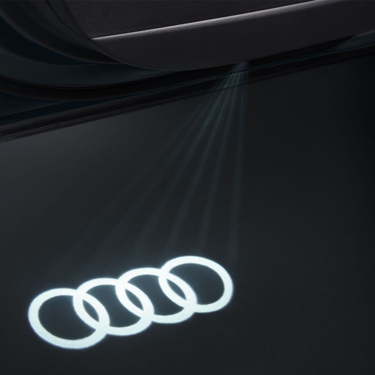 D.E.L. de seuil de porte avec projection des anneaux Audi, sur les modèles avec éclairage de seuil à LED