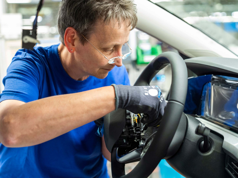 Mechanic working on steering wheel