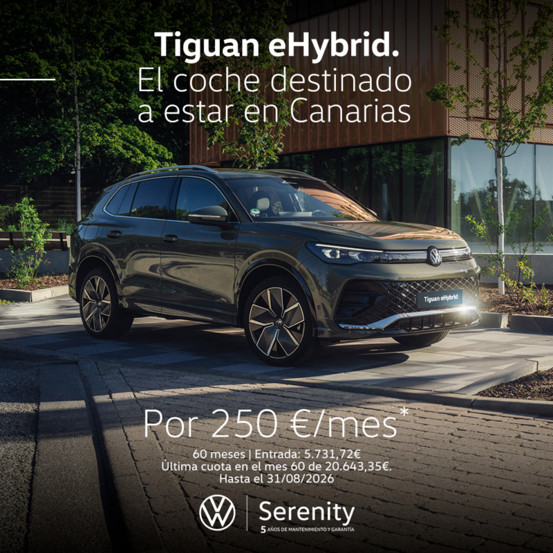 Volkswagen Tiguan eHybrid rojo, vista trasera, con cargador eléctrico. Descuentos especiales campaña remate final, solo hasta el 31 de diciembre, con hasta 8.000€ de descuento. Sujeto a financiación con Volkswagen Bank