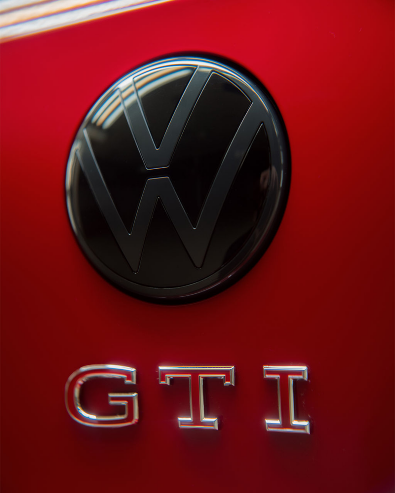 Close up image of a VW GTI logo badge. 