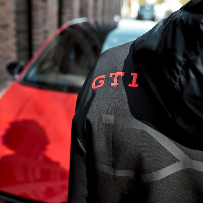 Close-up of a “GTI” logo on a merchandise pullover