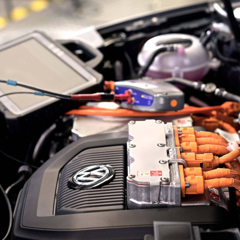 Close up photo of a VW engine undergoing a testing procedure. 