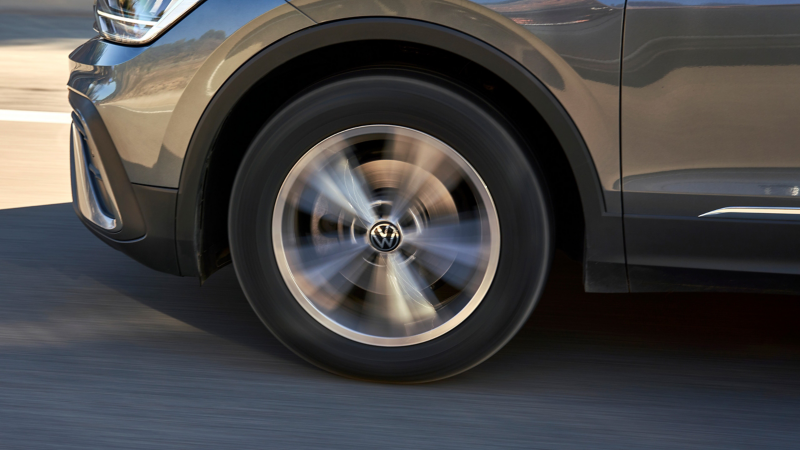 Man leans against a VW ID.3