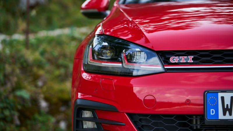 Close-up headlight of a VW Golf 7 GTI