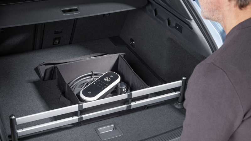 Open VW Accessories folding box for e-charging cables in luggage compartment
