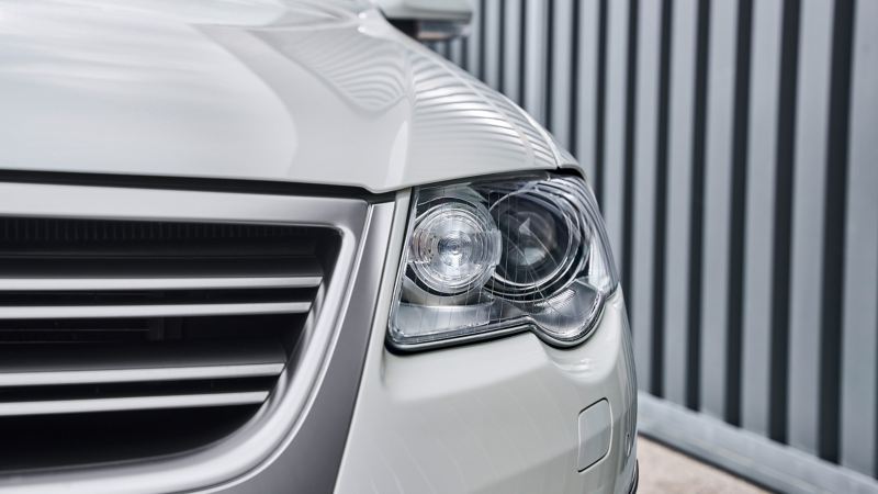 Close-up headlight of a VW Passat B6