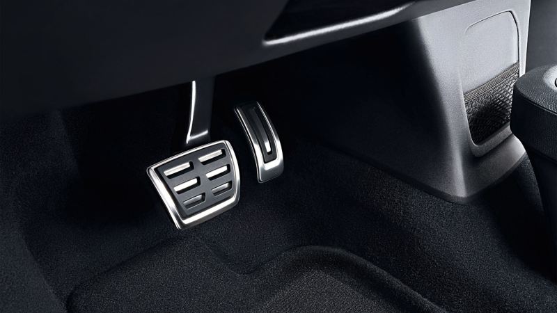 Detailed view of the footwell of a car with a stylish pedal pad set 