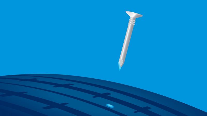 Illustration: Ein Nagel tritt aus der Einstichstelle eines Reifens, eine blaue viskose Masse verschließt das Loch – VW AirStop® Reifentechnologie