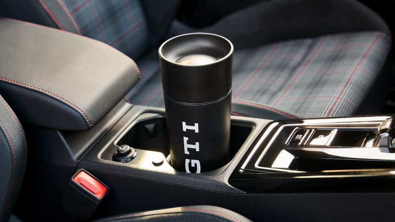 Close-up of VW GTI thermal cup in VW centre console