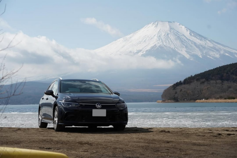 volkswagen car in front of Mt. Fuji