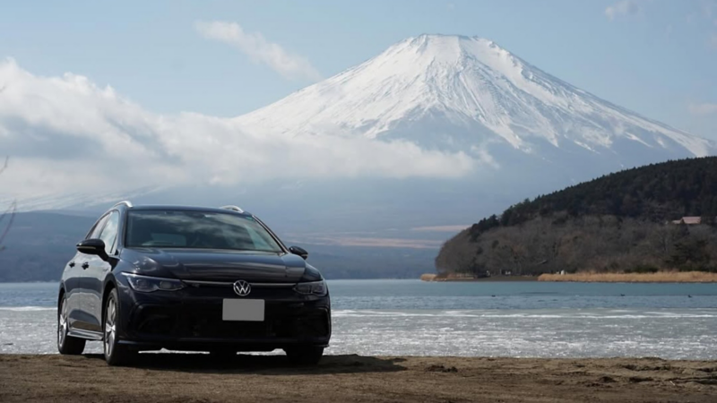 volkswagen car in front of mountain
