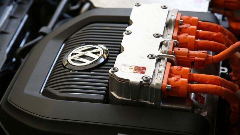 A series of connectors on an electronic device with the Volkswagen logo