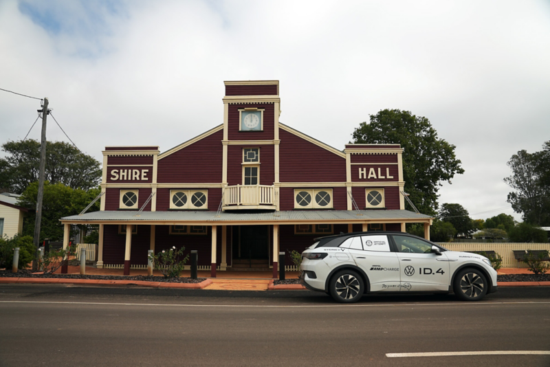 Volkswagen ID 4 parked outside an old establishment