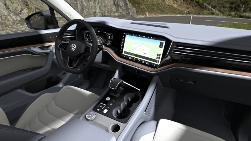 Indvendigt billede af VW Taigo, der viser de valgfrie ergoActive-sæder, cockpittet og jumbo-boxen.