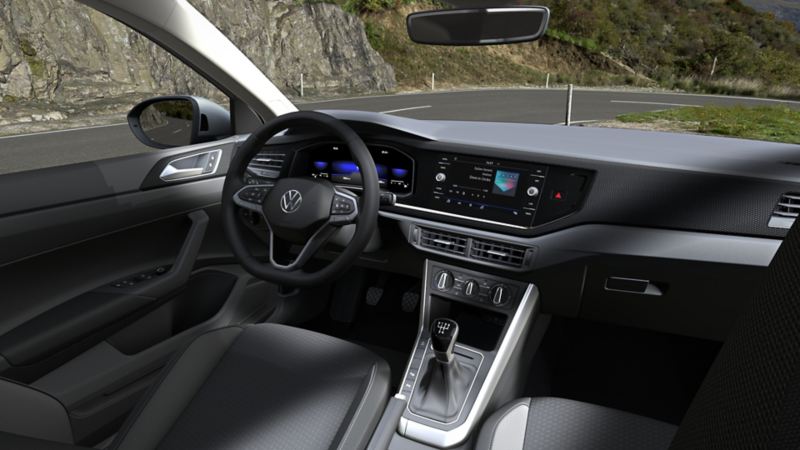 Indvendigt billede af VW Taigo, der viser de valgfrie ergoActive-sæder, cockpittet og jumbo-boxen.