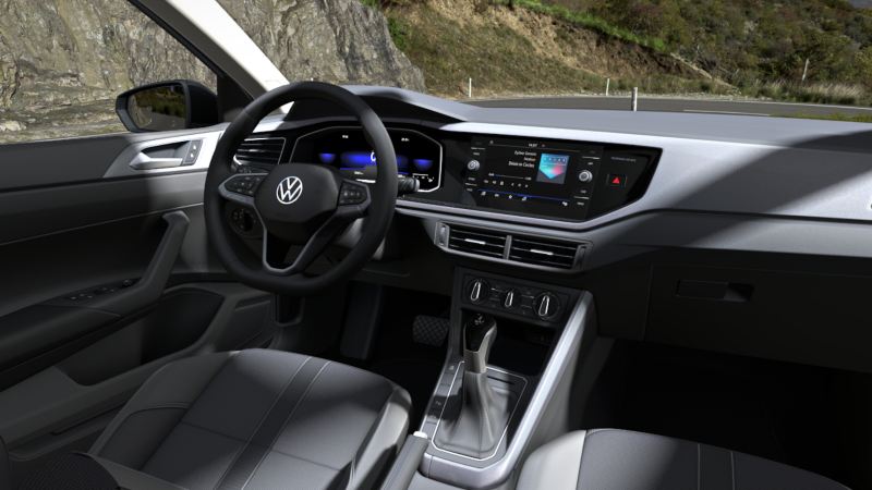 Indvendigt billede af VW Passat, der viser de valgfrie ergoActive-sæder, cockpittet og jumbo-boxen.