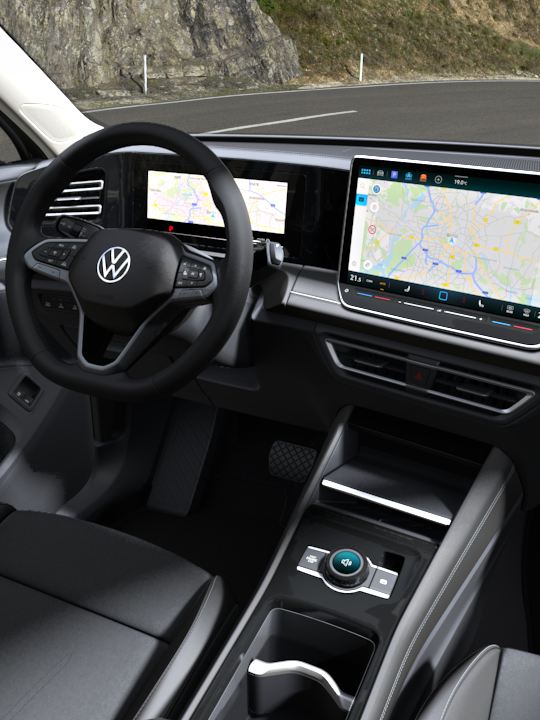 Indvendigt billede af VW Tiguan, der viser de valgfrie ergoActive-sæder, cockpittet og jumbo-boxen.
