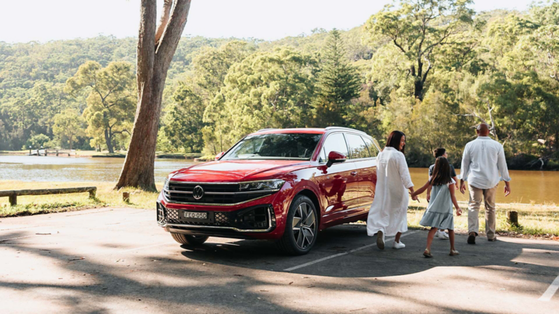 New 2024 Touareg by a lake with family