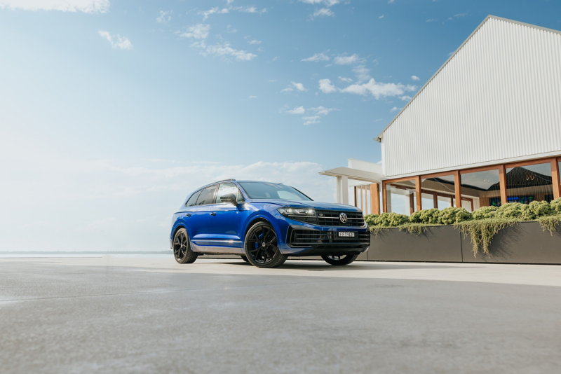 Volkswagen Touareg R parked in front of a yacht club