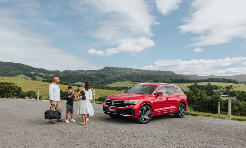 New 2024 Touareg by a lake with family