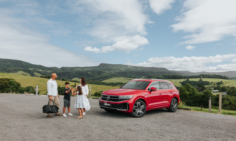 New 2024 Touareg by a lake with family