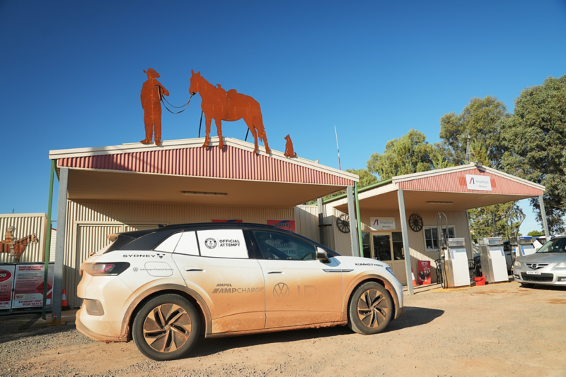 ID.4 parked outside building with cattle and farmer sign