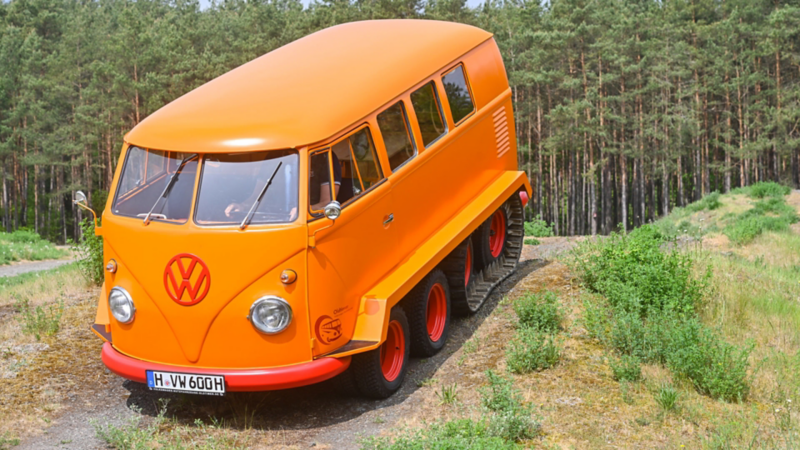 Driver using infotainment inside VW van