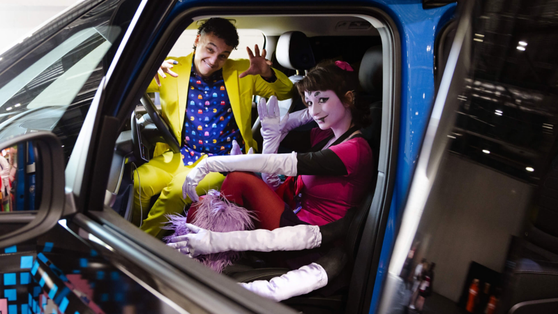 Children playing PAC-MAN inside a Volkswagen ID. Buzz using the AirConsole in-car gaming app