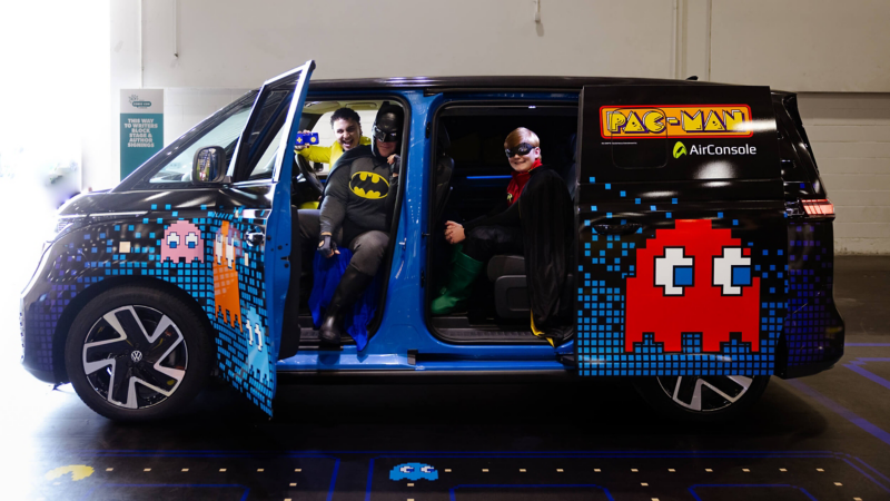 Cosplayers inside a PAC-MAN themed Volkswagen ID. Buzz at MCM Comic Con London
