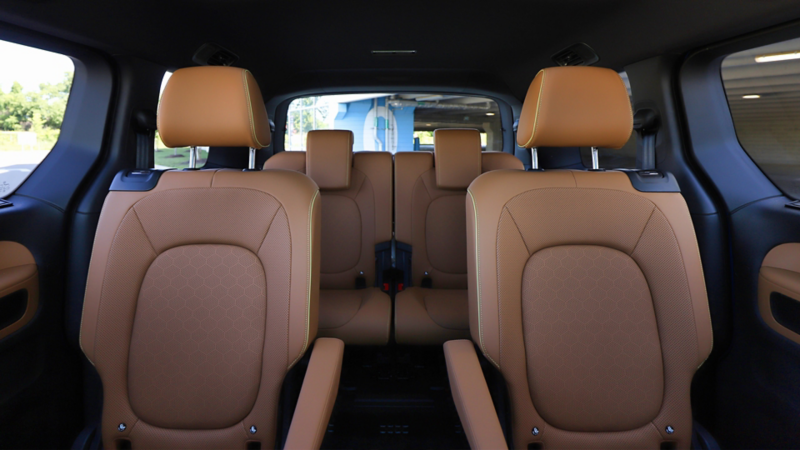 The rear seats of a 2025 ID. Buzz in a brown leather interior.