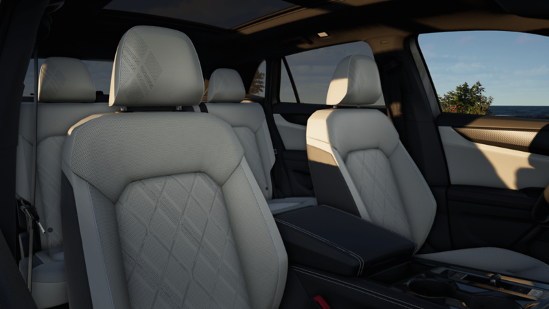 Gros plan sur un siège en cuir noir de l'Atlas Cross Sport avec fonction massage.