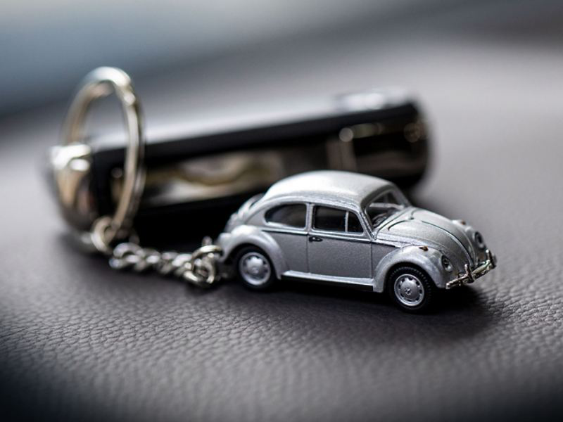 A cute VW Beetle keyring in silver