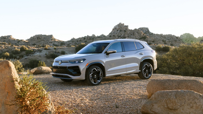 The 2025 Volkswagen Tiguan parked in a desert landscape.