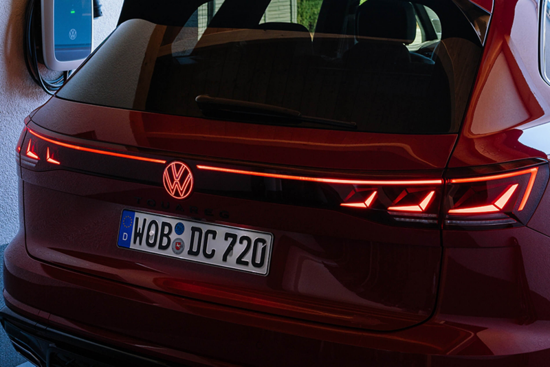 Rear view of red Touareg parked in garage