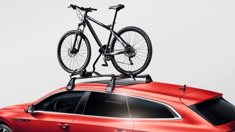 Bike carrier by VW Accessories on a blue VW Arteon SB model