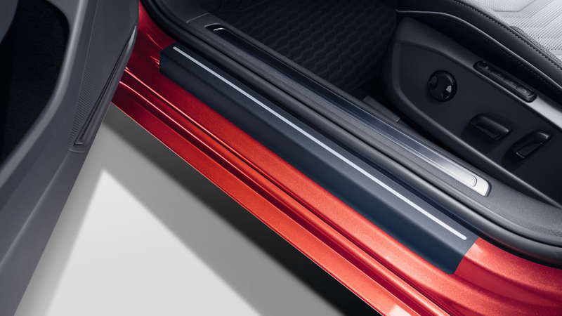 Door sill protection film by VW Accessories on a blue VW Arteon SB model