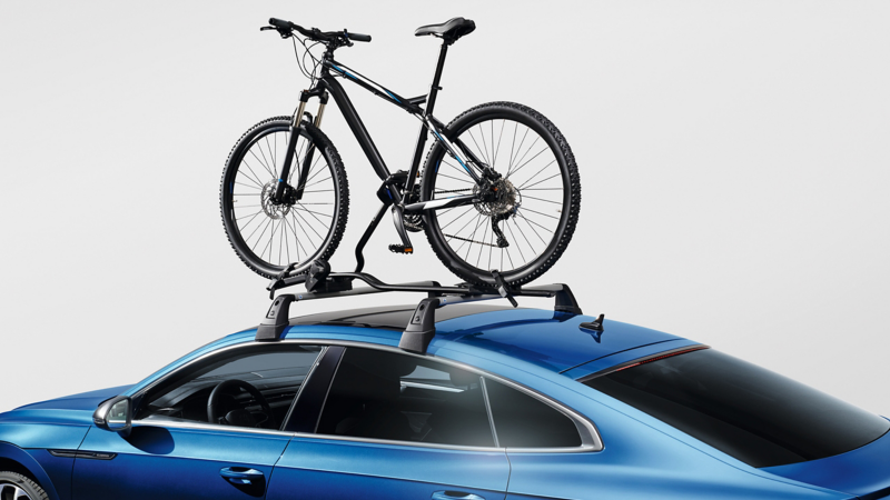 Bike carrier by VW Accessories on a blue VW Arteon model