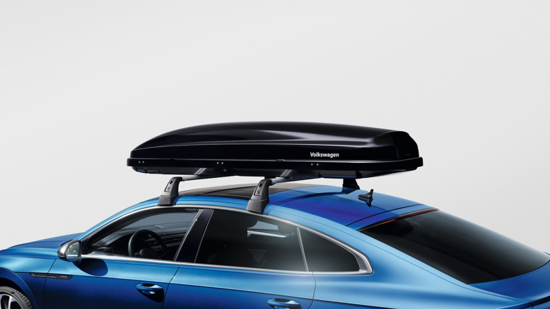 Roof box by VW Accessories on a blue VW Arteon model