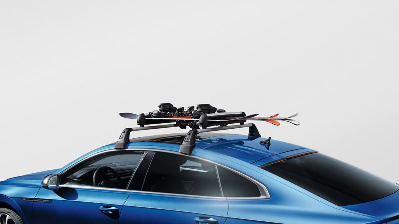 Ski and snowboard carrier by VW Accessories on a blue VW Arteon model