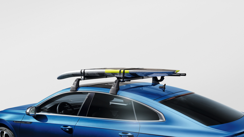 Surfboard arrier by VW Accessories on a blue VW Arteon model