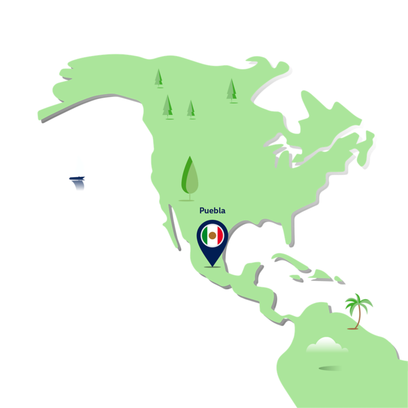 Grafische Karte Amerikas mit VW Standort Puebla, markiert durch eine Stecknadel mit der mexikanischen Flagge.