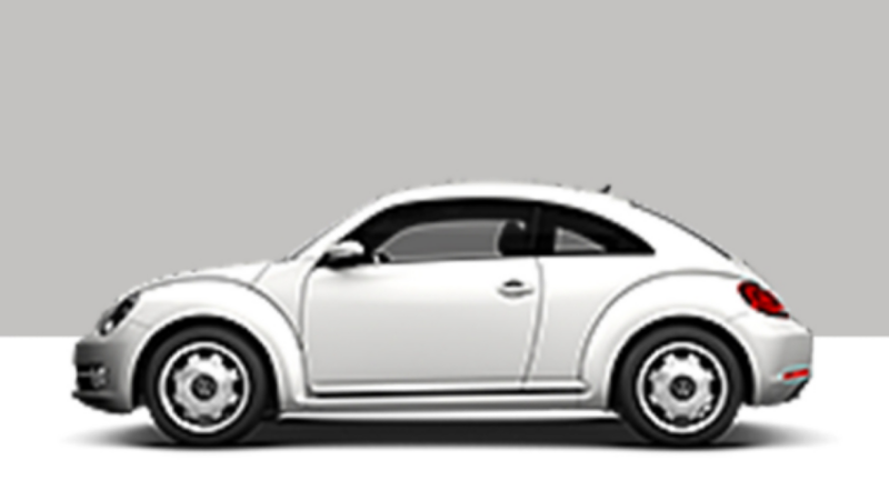 Side view of a VW Beetle on a grey background