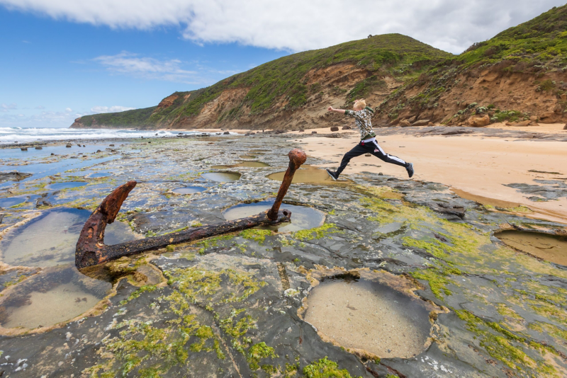Kid by rockpools