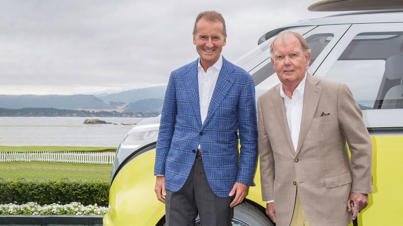Volkswagen Chairman of the Board of Management, Dr. Herbert Diess, with Ben Pon Jr. in front of the Volkswagen I.D. BUZZ.
